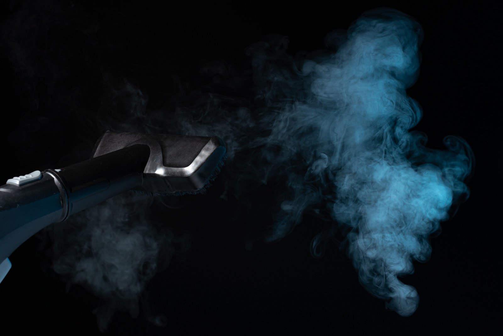 steam cleaning concept. steam on black background